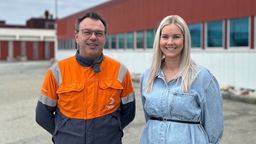 a man and woman posing for a picture
